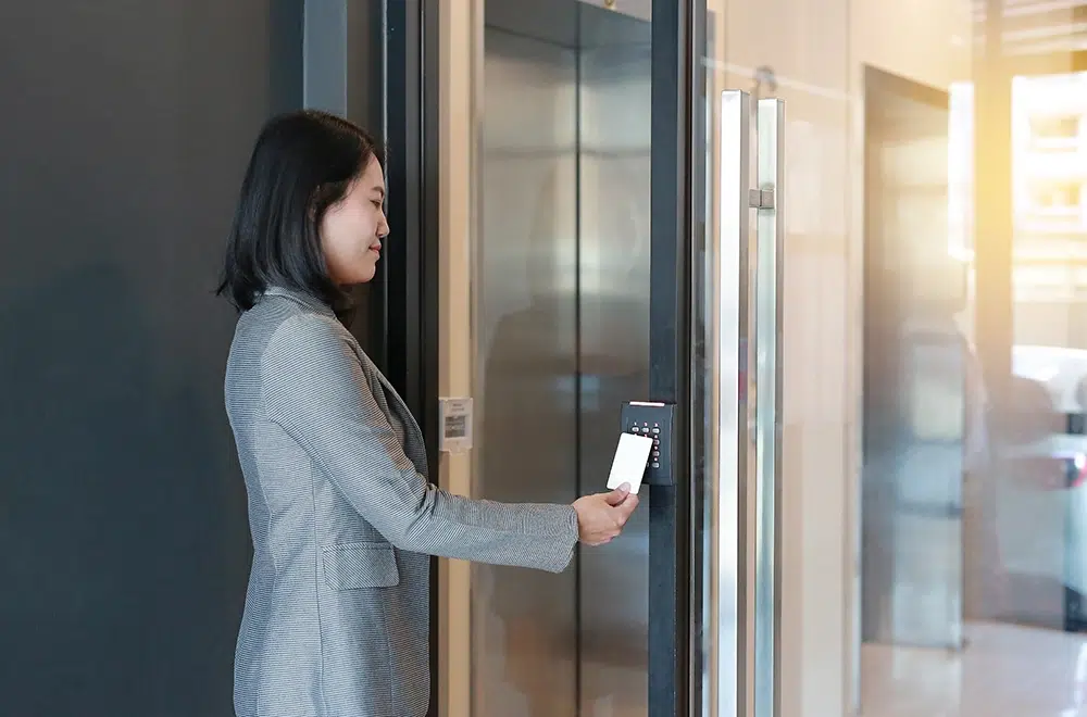 woman using a card scanner