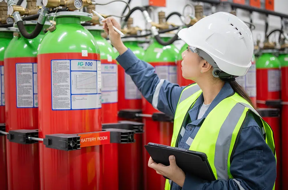 an engineer inspecting a gas suppression system
