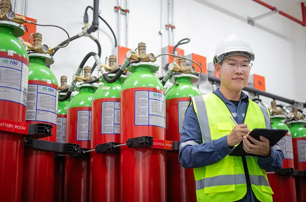 greentag engineer inspecting a gas suppression system