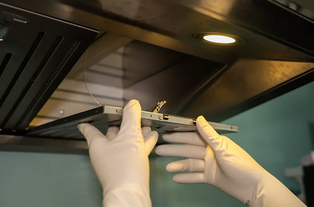 checking a commercial kitchen hood